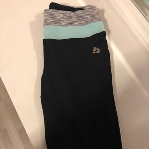 Black workout leggings with some blue and gray det